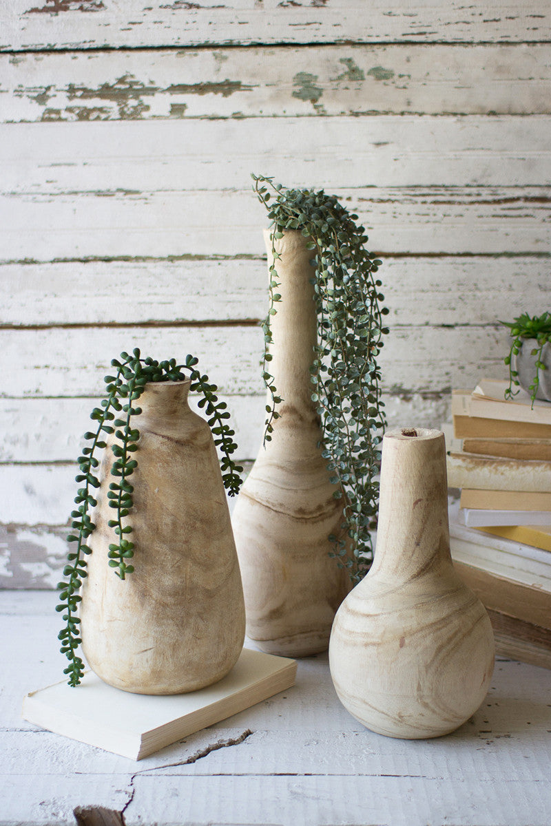 SET OF THREE HAND CARVED TALL WOODEN VASES