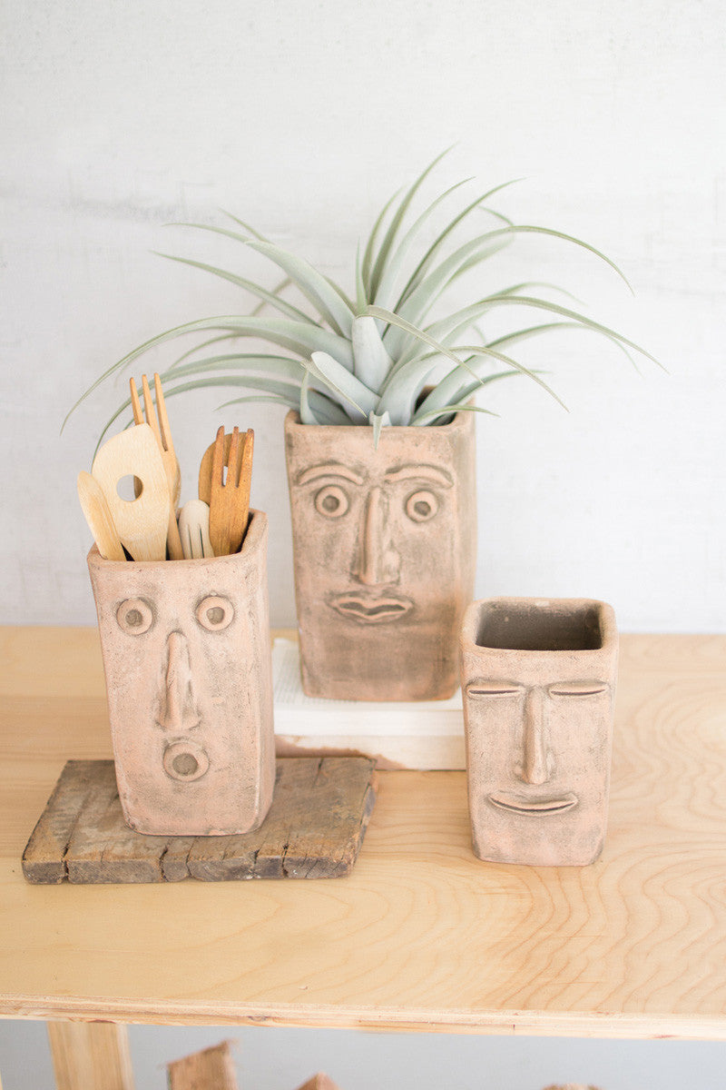 SET OF THREE SQUARE CLAY FACE PLANTERS