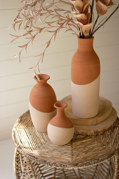 SET OF THREE IVORY DIPPED CLAY VASES