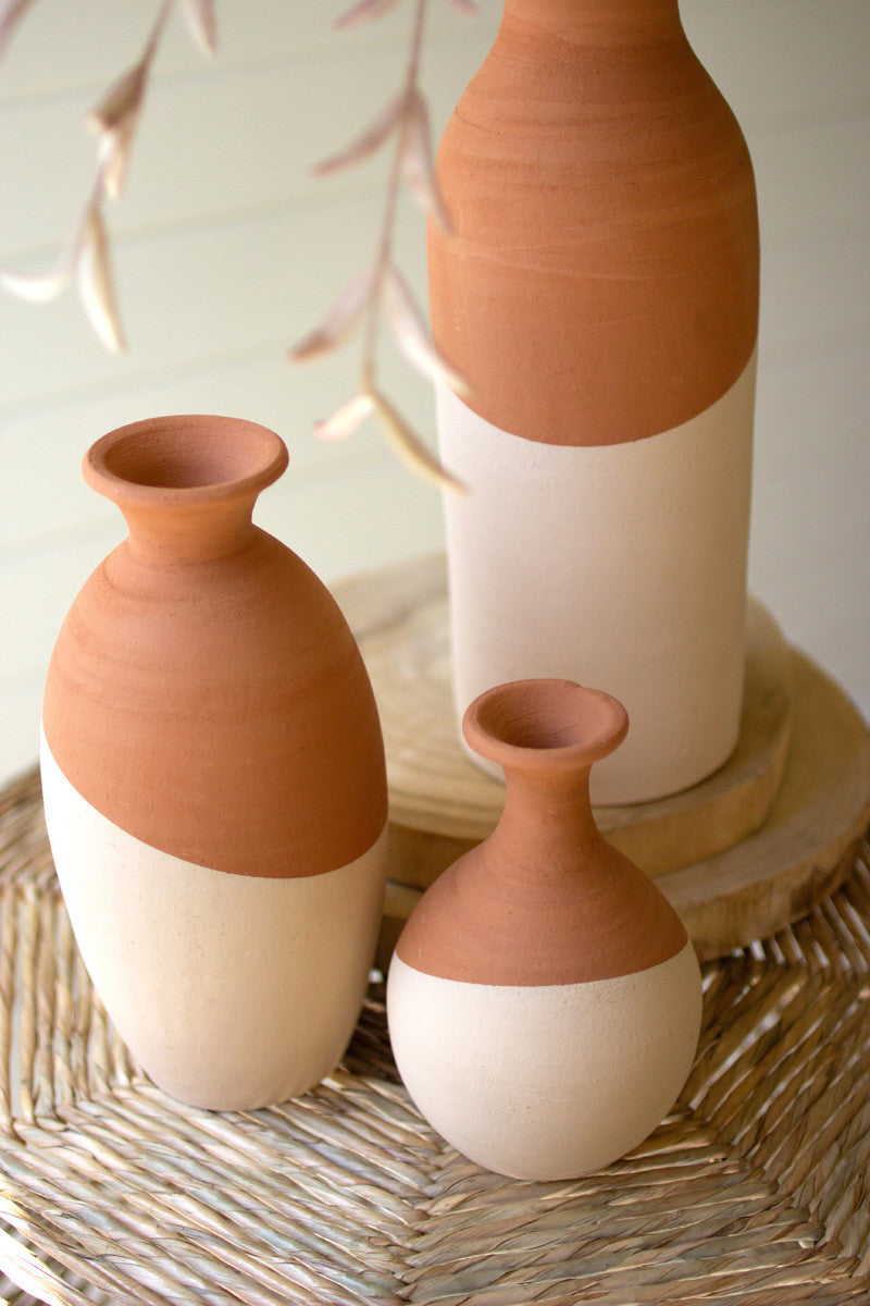 SET OF THREE IVORY DIPPED CLAY VASES
